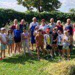Vom Acker zum Brot. Offizielles Gruppenfoto im Museumsgarten